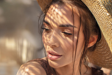 Portrait of beauty girl in summer hat.