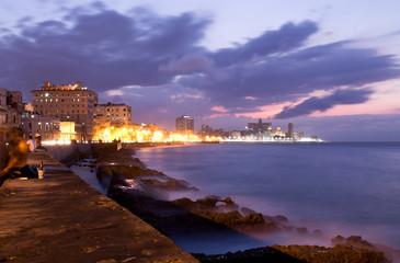 Fototapeta na wymiar Panoramic view of the Havana skyline and the famous seaside Malecon Avenue at sunset, Cuba