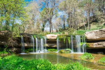 small waterfall in the countryside