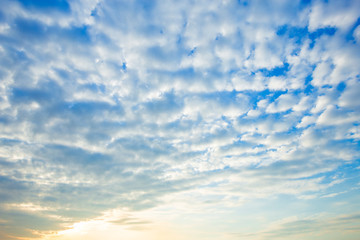 Fototapeta premium blue sky background texture with white clouds sunset.