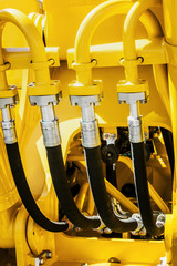 hydraulic system of tractor or excavator. Details and parts of construction and repair equipment