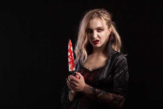 Portrait of beautiful and seductive boody vampire woman for hallooween