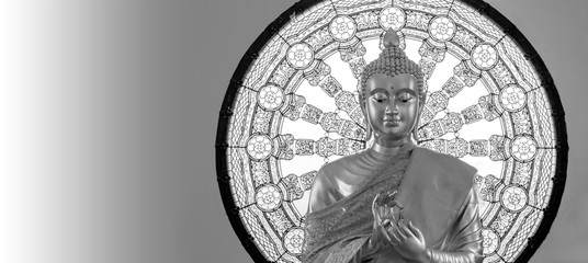 Big buddha statue standing with copy space on black and white tone on background