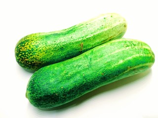  A picture of fresh cucumbers isolated on white background