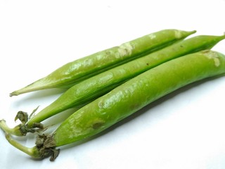 A picture of fresh green pea pods on white background