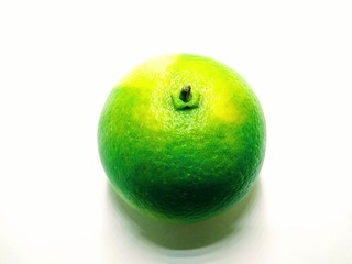 A picture of green orange isolated on a white background
