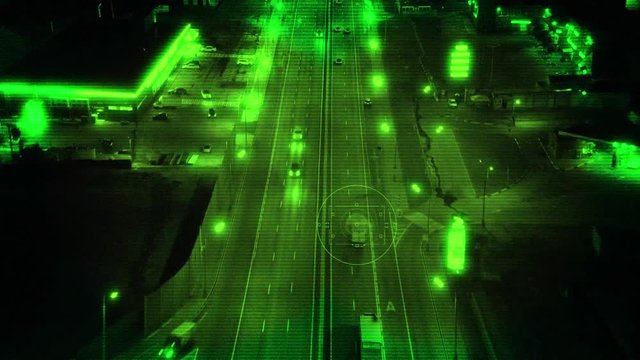 Night Vision from Drone with Zoom In, Tracking the Truck Driving on Highway at Night
