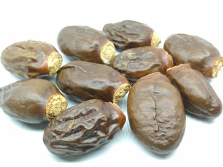 A picture of Lychee seed's on white background