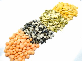 A picture of mixed lentils isolated on a white background