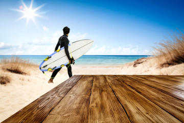 Wooden table background in the sunshine in the summer