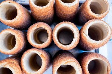 above view of group of Kürtös kalács, typical romanian and hungarian sweet horn shaped bread, common in east europe pastry