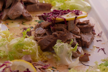 Delicious dish with swordfish and salad