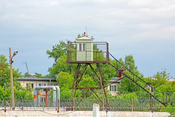 Prison fence and guard tower. Russia. Siberia	