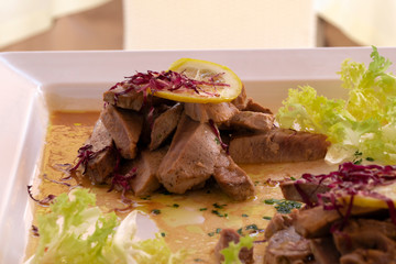 Delicious dish with swordfish and salad