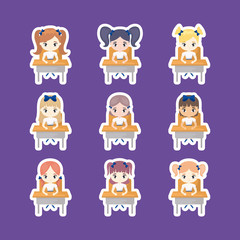 group of cute little students girls seated in school desks