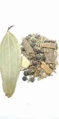 A portrait picture of mixed garam masala on white background