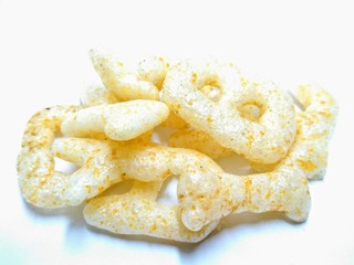A picture of alphabets shape cookies on white background