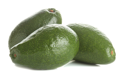 Fresh ripe tasty avocado on white isolated background. tropical fruit close-up