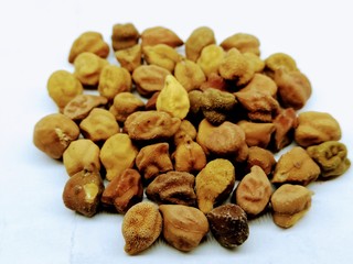 A picture of black chickpeas isolated on a white background