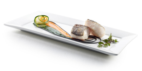 Merluza con calabacín, plato gourmet . Hake with courgette, gourmet dish.