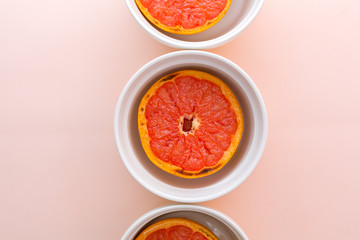 Baked Red Graipfruit on pink background