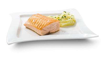Salmón con puré de patata, vista cenital. Salmon with mashed potatoes, overhead view.