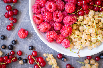 Fresh organic homegrown seasonal fruits such as raspberry, redcurrant, blackcurrant and whitecurrant