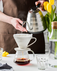 Vintage glass original coffee glass maker with hot brown beverage. One of the step of making...