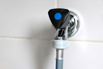 Water tap with a water supply hose connected, for use of a washing machine