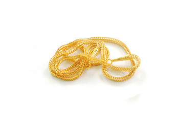 Singer of gold placed on a white background.