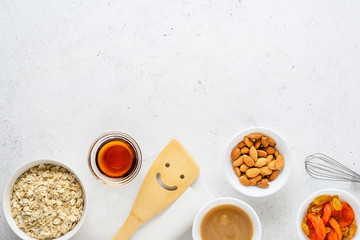 Obraz na płótnie Canvas Ingredients for cooking homemade granola (muesli). Healthy breakfast.