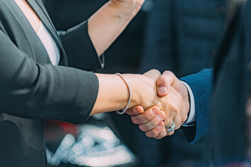 Business handshake. Business woman shaking hands with businessman