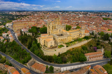 Aerial view of old bridge and Cathedral Saint Nazaire in the Beziers town. Cathedral built in the XIV century. France