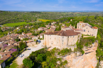Fototapeta na wymiar Aerial view of Castle of Bruniquel is a good example of early 12th century castle, Occitanie, France. The whole site has been classified as a historic monument and has recently been restored.