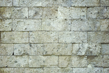 Facade of building, the stone wall background