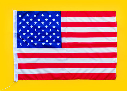 USA flag on yellow background. Bright colors