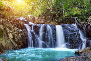 Fototapeta na wymiar Chet Kod waterfall in ecotourism study center, Chet Kod-Pong Kon Sao, Thailand.