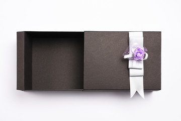 Open empty black gift box on white background