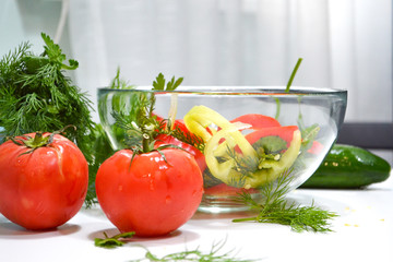 arvesting vegetable vitamin salad in the home kitchen, close-up