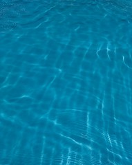 Blue pool water reflection glare