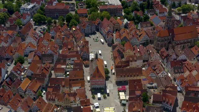 Aerial of the old part of town of Schorndorf in Germany. Round pan to the left.