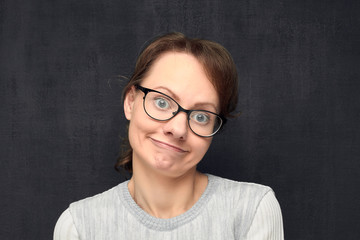 Fototapeta premium Portrait of cute and funny girl with glasses