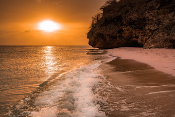 A fantastic sunset at the beach with a bonfire and BBQ on the island of Curacaio
