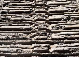 tractor tracts at the ocean beach sand backdrop © itsallgood