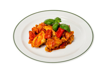 Chicken breast fillet braised with vegetables, paprika.