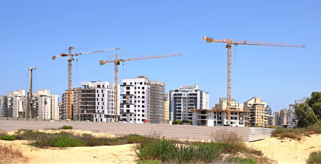 Fototapeta na wymiar Building yard of Housing construction of houses in a new area of the city Holon in Israel