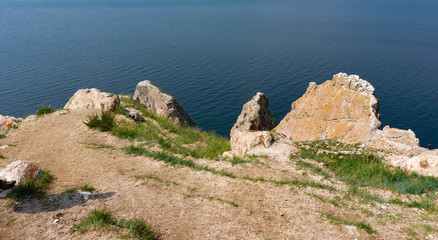 Fototapeta na wymiar grass on the rock view of lake baikal