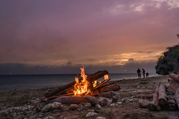 A fantastic sunset at the beach with a bonfire and BBQ on the island of Curacaio