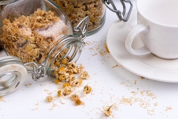 jars of dried chamomile 