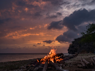 A fantastic sunset at the beach with a bonfire and BBQ on the island of Curacaio